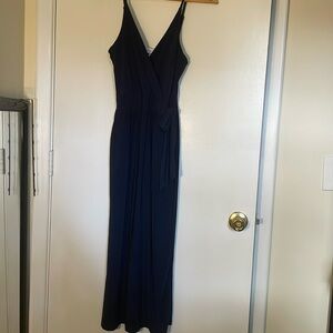 Navy jumpsuit. Cropped length. Tie at waist. Pockets!